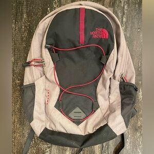 north face backpack pink and grey The Borealis for Women liter pack featuring a small front zip pocket with an internal organization Jester Backpack
